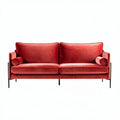 Velvet two-seater sofa in red with removable cushions and black metal frame
